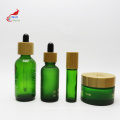 green glass jar with bamboo lid cosmetic packaging container set glass pump bottle bamboo cap BJ-216B